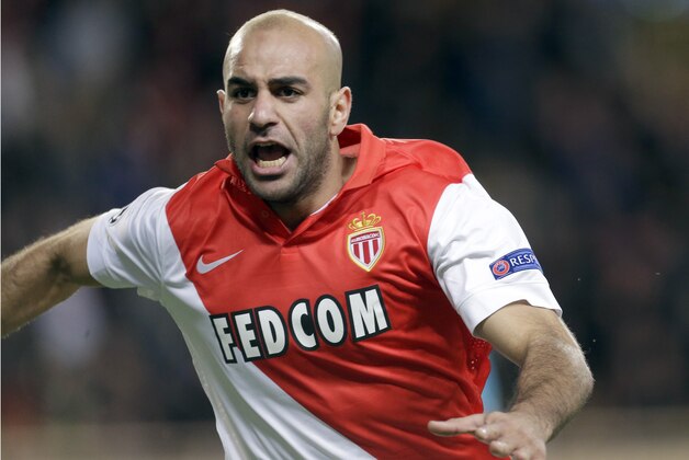 Monaco's Aymen Abdennour celebrates after scoring the opening goal during the Champions League Group C soccer match between Monaco and Zenit St. Petersburg at Louis II stadium in Monaco, Tuesday, Dec. 9, 2014. Monaco qualified for the knockout phase of the Champions League by defeating Zenit St. Petersburg 2-0 to finish top of Group C Tuesday. (AP Photo/Lionel Cironneau)