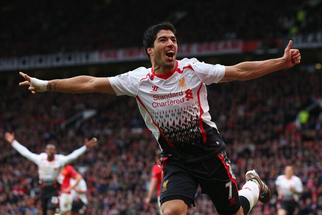 MANCHESTER, ENGLAND - MARCH 16:  Luis Suarez of Liverpool celebrates scoring his team's third goal during the Barclays Premier League match between Manchester United and Liverpool at Old Trafford on March 16, 2014 in Manchester, England.  (Photo by Alex Livesey/Getty Images)