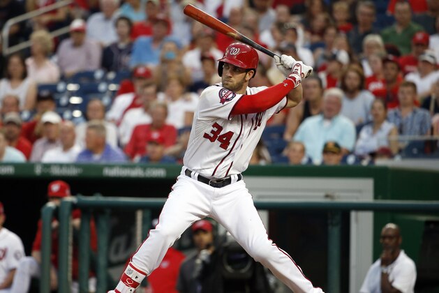 Washington Nationals right fielder Bryce Harper (34) bats during a baseball game against the Cincinnati Reds at Nationals Park, Monday, July 6, 2015, in Washington. (AP Photo/Alex Brandon)