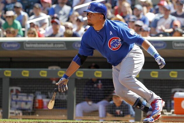 Chicago Cubs designated hitter Kyle Schwarber watches the flight of his two-run single off Minnesota Twins relief pitcher Aaron Thompson during the eighth inning of a baseball game in Minneapolis, Sunday, June 21, 2015. The Cubs won 8-0. (AP Photo/Ann Heisenfelt)