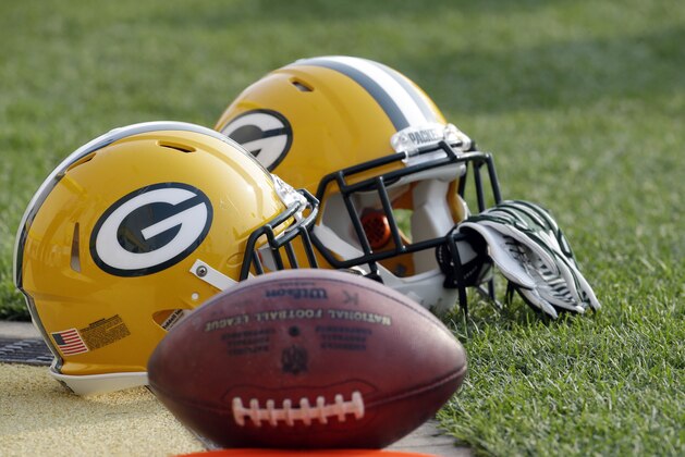 Green Bay Packers helmets during NFL football training camp Monday, July 28, 2014, in Green Bay, Wis. (AP Photo/Morry Gash)