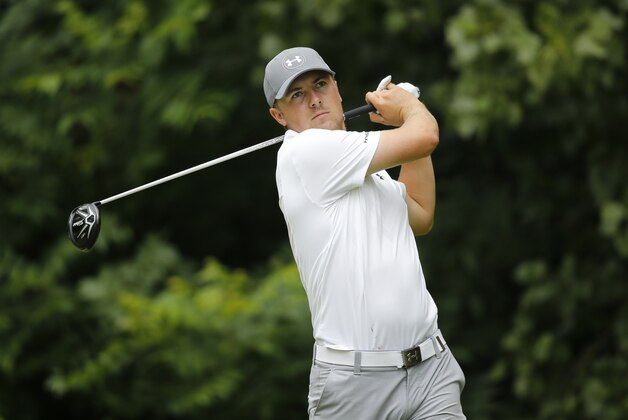 Jordan Spieth watches his tee shot on the second hole during the third round of the John Deere Classic golf tournament Saturday, July 11, 2015, in Silvis, Ill. (AP Photo/Charles Rex Arbogast)