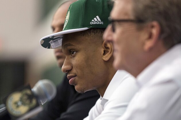 Milwaukee Bucks' Rashad Vaughn speaks during an NBA basketball news conference Friday, June 26, 2015, in Milwaukee. Vaughn, from UNLV, was selected 17th overall in the NBA draft the night before. (AP Photo/Tom Lynn)