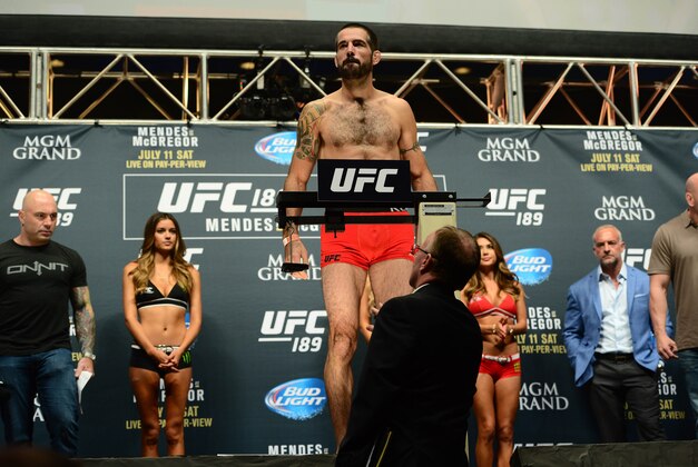 Jul 10, 2015; Las Vegas, NV, USA; Matt Brown weighs in against Tim Means  (not pictured) during weigh-ins for UFC 189 at MGM Grand Garden Arena. Mandatory Credit: Joe Camporeale-USA TODAY Sports