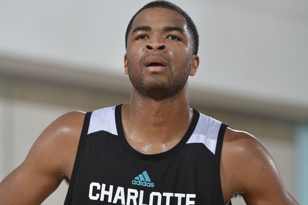 ORLANDO, FL - JULY 4:  Aaron Harrison #9 of the Charlotte Hornets looks on against the Oklahoma City Thunder on July 4, 2015 at Amway Center in Orlando, Florida. NOTE TO USER: User expressly acknowledges and agrees that, by downloading and or using this photograph, User is consenting to the terms and conditions of the Getty Images License Agreement. Mandatory Copyright Notice: Copyright 2015 NBAE  (Photo by Fernando Medina/NBAE via Getty Images)