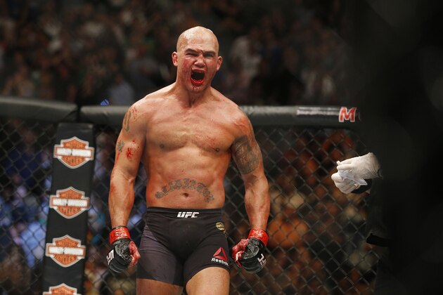 Robbie Lawler celebrates after defeating Rory MacDonald in their welterweight title mixed martial arts bout at UFC 189 on Saturday, July 11, 2015, in Las Vegas. (AP Photo/John Locher)