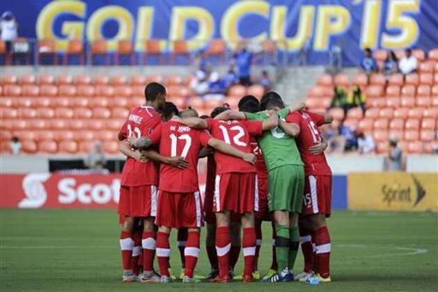 Canada players huddle before their CONCACAF Gold Cup soccer match against Jamaica, Saturday, July 11, 2015, in Houston. (AP Photo/Eric Christian Smith)