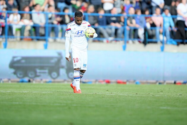 Lyon's Alexandre Lacazette reacts during his French League One soccer match against Caen, in Caen, western France, Saturday, May 9, 2015. Caen won 3-0. (AP Photo/David Vincent) Lyon's Alexandre Lacazette reacts during his French League One soccer match against Caen, in Caen, western France, Saturday, May 9, 2015. Caen won 3-0. (AP Photo/David Vincent)