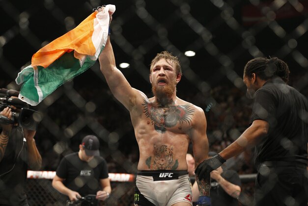 Conor McGregor celebrates after defeating Chad Mendes during their interim featherweight title mixed martial arts bout at UFC 189 on Saturday, July 11, 2015, in Las Vegas. (AP Photo/John Locher) Conor McGregor celebrates after defeating Chad Mendes during their interim featherweight title mixed martial arts bout at UFC 189 on Saturday, July 11, 2015, in Las Vegas. (AP Photo/John Locher)