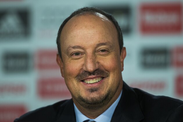 New Real Madrid coach Rafael Benitez smiles during a press conference at the Santiago Bernabeu stadium in Madrid, Spain, Wednesday, June 3, 2015, after signing for Real Madrid. (AP Photo/Andres Kudacki)