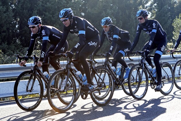 Team Sky cycling team rider Chris Froome, second left,  takes a training ride with teammates during the Team Sky Media Day in Alcudia, Majorca, Spain, Sunday Jan. 11, 2015. Five years on from the creation of Team Sky media has been invited  to spend a day with Team Sky riders and managements to look back over the last five years and look forward to 2020. (AP Photo/Joan Llado)