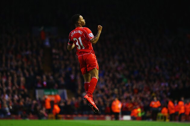 LIVERPOOL, ENGLAND - APRIL 13:  Raheem Sterling of Liverpool celebrates as he scores their first goal during the Barclays Premier League match between Liverpool and Newcastle United at Anfield on April 13, 2015 in Liverpool, England.  (Photo by Clive Brunskill/Getty Images)