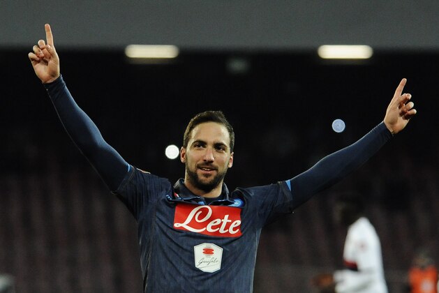 Napoli's Gonzalo Higuain celebrates after scoring his second goal on a penalty kick during a Serie A soccer match between Napoli and Genoa, at the San Paolo stadium in Naples, Italy, Monday, Jan. 26, 2015. (AP Photo/Salvatore Laporta)