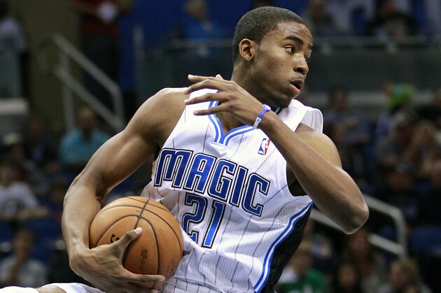 Orlando Magic's Moe Harkless (21) grabs a rebound during the first half of an NBA basketball game against the Detroit Pistons, Wednesday,Nov. 21, 2012, in Orlando, Fla. (AP Photo/John Raoux)