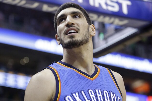 Oklahoma City Thunder center Enes Kanter (34) looks on in the second quarter of an NBA basketball game against the Utah Jazz Saturday, March 28, 2015, in Salt Lake City.  (AP Photo/Rick Bowmer)