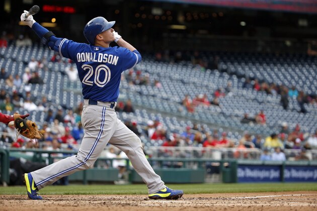 Toronto Blue Jays third baseman Josh Donaldson (20) bats during the first baseball game of a doubleheader against the Washington Nationals at Nationals Park, Tuesday, June 2, 2015, in Washington. The Nationals won the first game 2-0. (AP Photo/Alex Brandon)