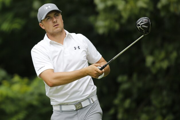 Jordan Spieth watches his tee shot on the second hole during the third round of the John Deere Classic golf tournament Saturday, July 11, 2015, in Silvis, Ill. (AP Photo/Charles Rex Arbogast)