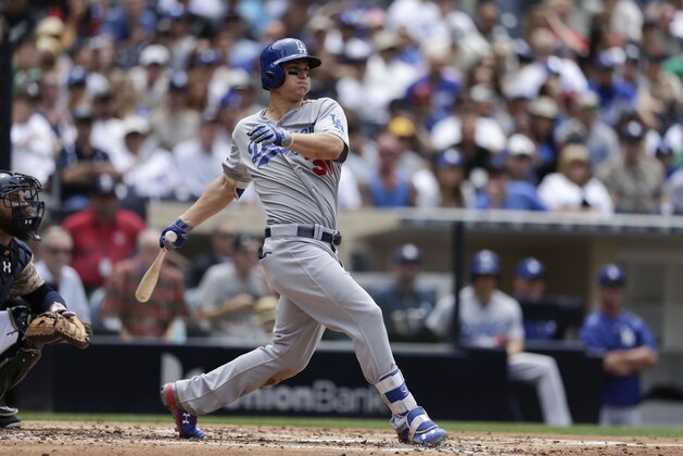Los Angeles Dodgers' Joc Pederson swings during an at bat against the San Diego Padres during the second inning of a baseball game Sunday, June 14, 2015, in San Diego. (AP Photo/Gregory Bull)