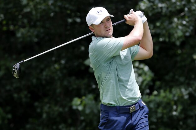 Jordan Spieth watches his tee shot on the second hole during the final round of the John Deere Classic golf tournament Sunday, July 12, 2015, in Silvis, Ill. (AP Photo/Charles Rex Arbogast)