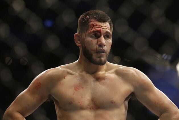 Jorge Masvidal walks to his corner after the second round against Tim Means during the first round of a UFC lightweight mixed martial arts fight in San Jose, Saturday, April 20, 2013. Masvidal won by unanimous decision. (AP Photo/Jeff Chiu)