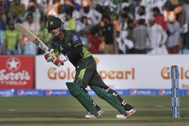 Pakistan's Mohammad Hafeez plays a shot during third one-day international match against Zimbabwe at Gaddafi Stadium in Lahore, Pakistan, Sunday, May 31, 2015. (AP Photo/K. M. Chaudary)