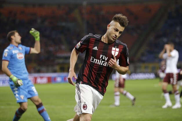AC Milan's Stephan El Shaarawy celebrates after scoring during the Serie A soccer match between AC Milan and Torino at the San Siro stadium in Milan, Italy, Sunday, May 24, 2015. (AP Photo/Antonio Calanni)