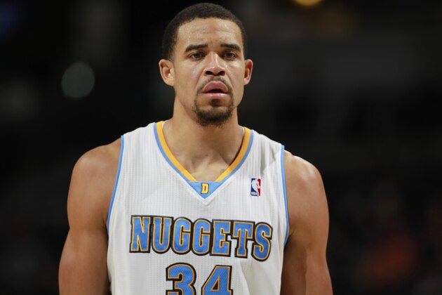 Denver Nuggets forward JaVale McGee looks on against the San Antonio Spurs in the third quarter of the Nuggets' 98-94 victory in an NBA preseason basketball game in Denver on Monday, Oct. 14, 2013. (AP Photo/David Zalubowski)