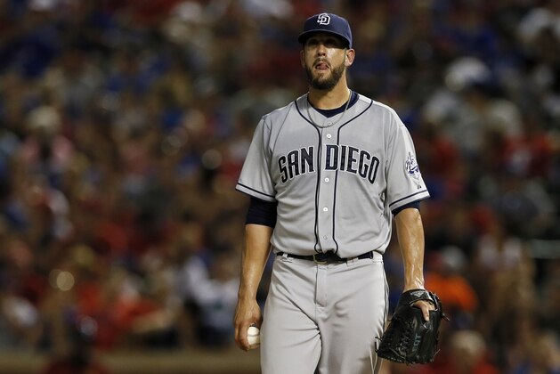San Diego Padres' James Shields pauses between pitches to the Texas Rangers in the fifth inning of an interleague baseball game Saturday, July 11, 2015, in Arlington, Texas. (AP Photo/Tony Gutierrez)