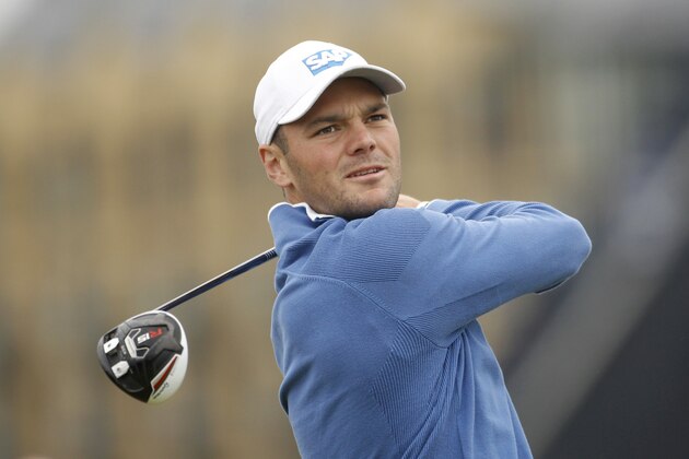 Germany's Martin Kaymer tees off on the 3rd hole at the Old Course, St Andrews, Scotland, Monday, July 13, 2015.  Kaymer played a practice round ahead of the 2015 Open Golf Championship that is due to take place at St. Andrews July16-19.  (AP Photo/Peter Morrison)