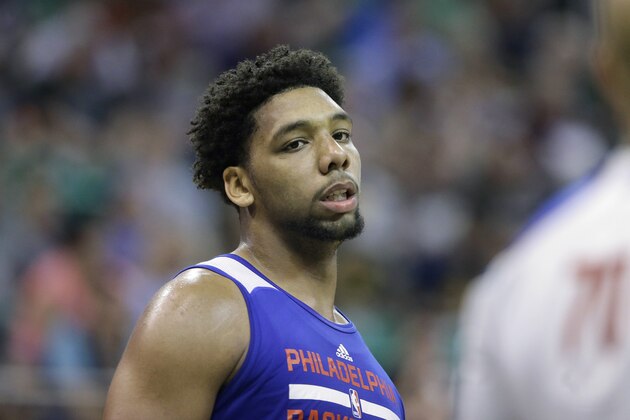 FILE - In this July 6, 2015, file photo, Philadelphia 76ers' Jahlil Okafor looks on during the first half of an NBA summer league basketball game against the San Antonio Spurs in Salt Lake City. Former Duke center Jahlil Okafor surprisingly slipped to the 76ers at the No. 3 pick of the NBA draft. Okafor, who may be more focused on winning now than the team’s rebuilding plan, has gotten his first taste of NBA action in Salt Lake City.  (AP Photo/Rick Bowmer, File)