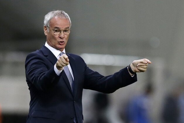 In this photo taken on Friday, Nov. 10, 2014, Greece's coach Claudio Ranieri of Italy reacts during the Group F Euro 2016 qualifying soccer match between Greece and Faroe Islands, at the Georgios Karaiskakis stadium, in the port of Piraeus, near Athens. Late Saturday, Nov. 15, 2015, Greece’s national soccer federation EPO has placed Ranieri and his assistants on leave. A statement said under-19 team coach Costas Tsanas would coach the team in a friendly against Serbia Tuesday. (AP Photo/Thanassis Stavrakis)