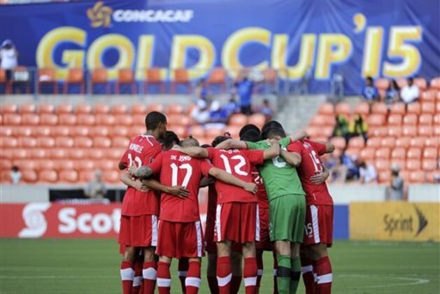 Canada players huddle before their CONCACAF Gold Cup soccer match against Jamaica, Saturday, July 11, 2015, in Houston. (AP Photo/Eric Christian Smith)
