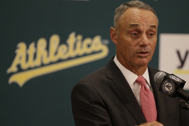 Baseball Commissioner Rob Manfred speaks gestures during a media conference Friday, June 19, 2015, prior to a baseball game between the Los Angeles Angels and the Oakland Athletics in Oakland, Calif. (AP Photo/Ben Margot)
