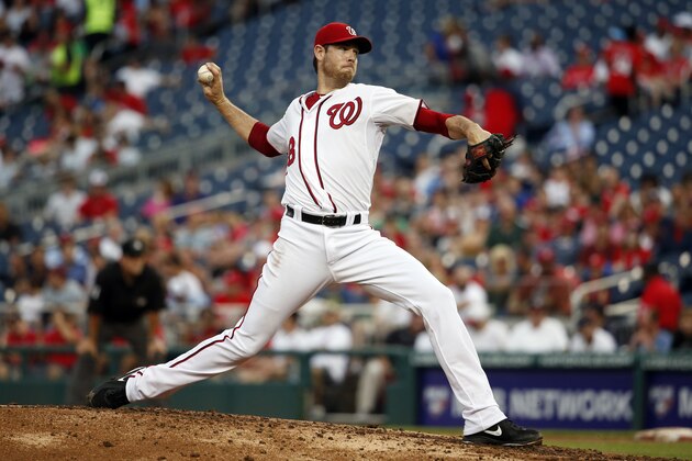Washington Nationals starting pitcher Doug Fister (58) throws during a baseball game against the Cincinnati Reds at Nationals Park, Monday, July 6, 2015, in Washington. (AP Photo/Alex Brandon)