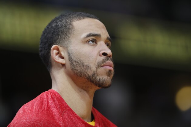 In this photograph taken on Friday, Jan. 23, 2015, Denver Nuggets center JaVale McGee warms up before facing the Boston Celtics in the first quarter of an NBA basketball game in Denver. The oft-injured McGee was sent to Philaelphia before the NBA trade deadline pased on Thursday, Feb. 19, 2015. (AP Photo/David Zalubowski)