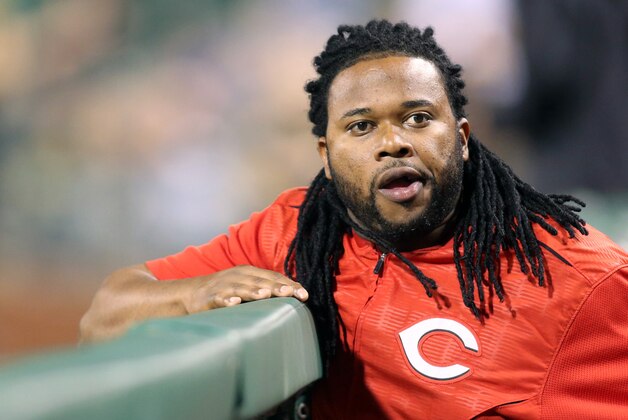 May 5, 2015; Pittsburgh, PA, USA; Cincinnati Reds pitcher Johnny Cueto (47) looks on over the dugout rail against the Pittsburgh Pirates during the sixth inning at PNC Park. Mandatory Credit: Charles LeClaire-USA TODAY Sports