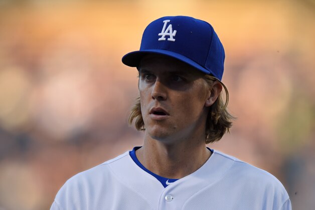 Los Angeles Dodgers starting pitcher Zack Greinke walks back to the dugout after the first inning of a baseball game against the Texas Rangers, Thursday, June 18, 2015, in Los Angeles. (AP Photo/Mark J. Terrill) Los Angeles Dodgers starting pitcher Zack Greinke walks back to the dugout after the first inning of a baseball game against the Texas Rangers, Thursday, June 18, 2015, in Los Angeles. (AP Photo/Mark J. Terrill)