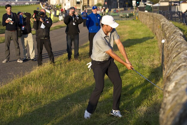 Jul 13, 2015; St. Andrews, Scotland, GBR; Jordan Spieth  plays a shot against the wall at the 17th Road Hole during a practice round for the 144th Open Championship at Royal and Ancient Golf Club of St Andrews. Mandatory Credit: Ian Rutherford-USA TODAY Sports