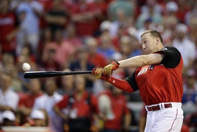 National League’s Todd Frazier, of the Cincinnati Reds, hits during the MLB All-Star baseball Home Run Derby, Monday, July 13, 2015, in Cincinnati. (AP Photo/John Minchillo)