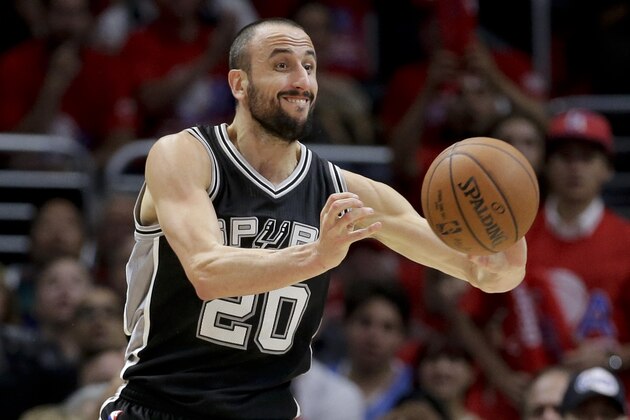 San Antonio Spurs guard Manu Ginobili passes against the Los Angeles Clippers during the second half of Game 1 of a first-round NBA basketball  playoff series in Los Angeles, Sunday, April 19, 2015. (AP Photo/Chris Carlson)