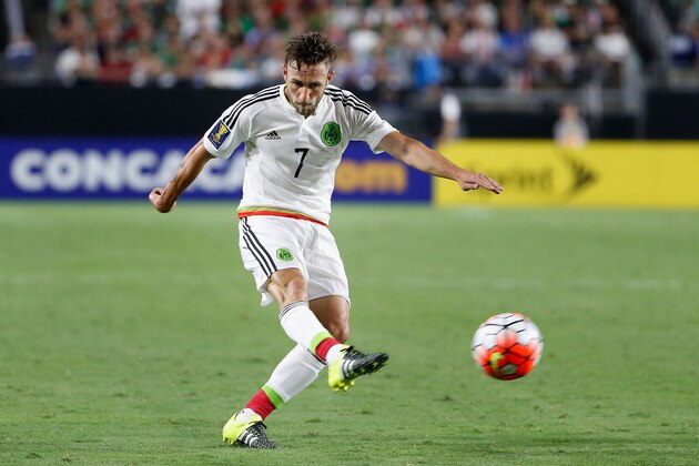 GLENDALE, AZ - JULY 12:  Miguel Layun #7 of Mexico shoots the ball against Guatemala during the second half of the 2015 CONCACAF Gold Cup group C match at University of Phoenix Stadium on July 12, 2015 in Glendale, Arizona. Guatemala and Mexico finished in a 0-0 tie.  (Photo by Christian Petersen/Getty Images)