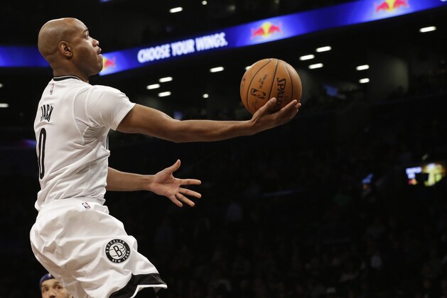 Brooklyn Nets guard Jarrett Jack goes to the basket during the second half of an NBA basketball game against the Washington Wizards, Friday, April 10, 2015, at  New York. The Nets won 117-80. (AP Photo/Mary Altaffer)