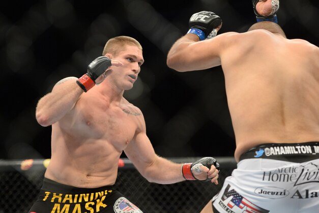Dec 6, 2014; Las Vegas, NV, USA; Todd Duffee (red) and Anthony Hamilton (blue) fight during UFC 181 at Madalay Bay Events Center. Duffee won via first round knockout. Mandatory Credit: Joe Camporeale-USA TODAY Sports