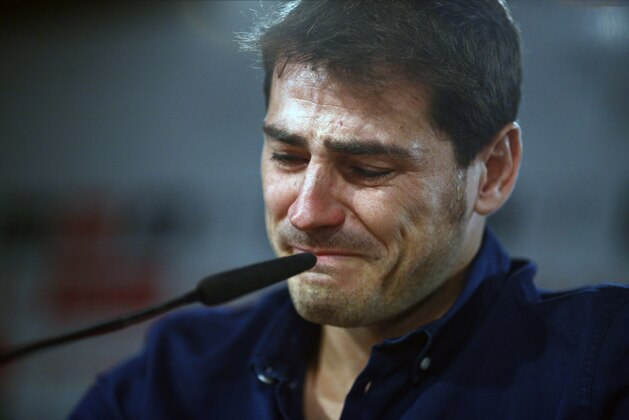 Real Madrid's goalkeeper Iker Casillas reacts during press conference at the Santiago Bernabeu stadium in Madrid, Spain, Sunday, July 12, 2015.  Casillas is leaving Real Madrid to join Portuguese club FC Porto after 16 seasons in which he helped the Spanish powerhouse win a slew of titles that included three Champions League crowns and five Spanish league trophies Casillas, 34, joined the club's youth academy at age 9 before debuting for its first team in 1999. (AP Photo/Oscar del Pozo)