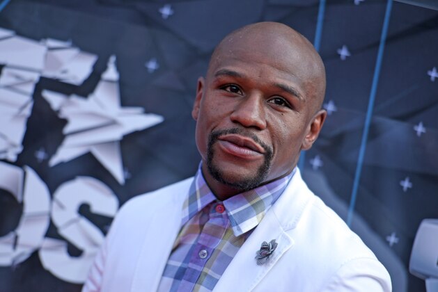 Floyd Mayweather, Jr. arrives at the BET Awards at the Microsoft Theater on Sunday, June 28, 2015, in Los Angeles. (Photo by Richard Shotwell/Invision/AP)