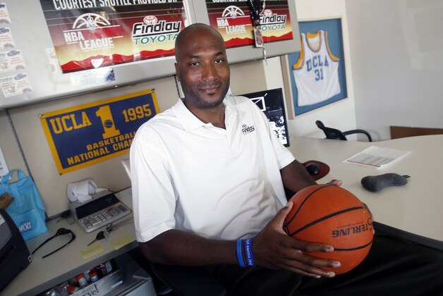 FILE - In this Sept. 18, 2010, file photo, former UCLA basketball player Ed O'Bannon Jr. sits in his office in Henderson, Nev. A federal judge ruled Friday, Aug. 8, 2014 that the NCAA can't stop college football and basketball players from selling the rights to their names and likenesses, opening the way to athletes getting payouts once their college careers are over. (AP Photo/Isaac Brekken, File) FILE - In this Sept. 18, 2010, file photo, former UCLA basketball player Ed O'Bannon Jr. sits in his office in Henderson, Nev. A federal judge ruled Friday, Aug. 8, 2014 that the NCAA can't stop college football and basketball players from selling the rights to their names and likenesses, opening the way to athletes getting payouts once their college careers are over. (AP Photo/Isaac Brekken, File)