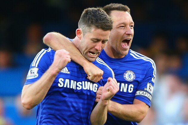 LONDON, ENGLAND - APRIL 18:  John Terry and Gary Cahill of Chelsea celebrate after the Barclays Premier League match between Chelsea and Manchester United at Stamford Bridge on April 18, 2015 in London, England.  (Photo by Ian Walton/Getty Images)