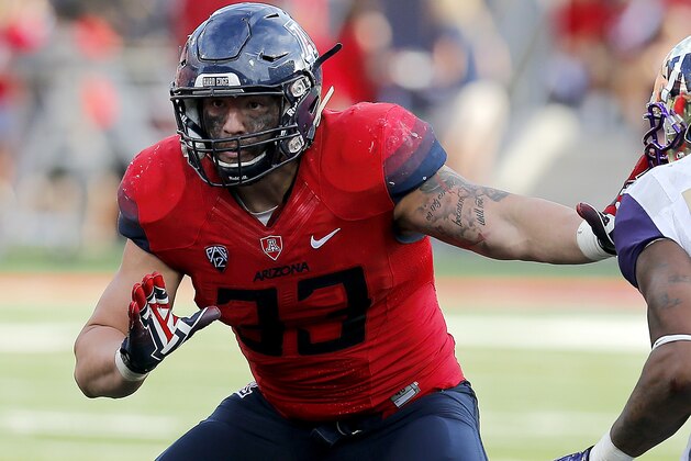 Arizona linebacker Scooby Wright III (33) during the first half of an NCAA college football game against Washington, Saturday, Nov. 15, 2014, in Tucson, Ariz. (AP Photo/Rick Scuteri)