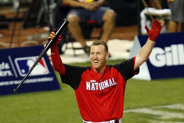 Jul 13, 2015; Cincinnati, OH, USA; National League third baseman Todd Frazier (21) of the Cincinnati Reds celebrates after winning during the 2015 Home Run Derby the day before the MLB All Star Game at Great American Ballpark. Mandatory Credit: Rick Osentoski-USA TODAY Sports