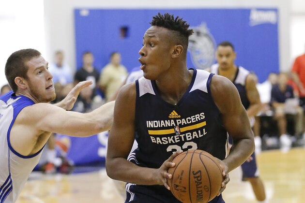 Indiana Pacers' Myles Turner looks for a shot during the first half of an NBA summer league basketball game against the Detroit Pistons, Wednesday, July 8, 2015, in Orlando, Fla. (AP Photo/John Raoux)